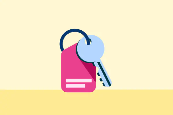 Illustration of a hand holding a house key, as a guide to buying an investment property.