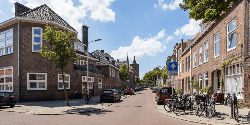 A neighborhood of Dutch houses illustrating the housing market affected by the Affordable Rent Act